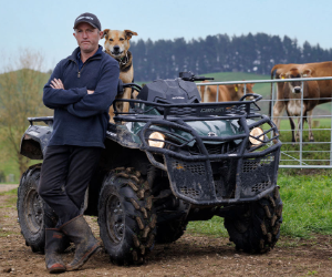 Outlander Pro HD5 ATV with farmer and farm dog